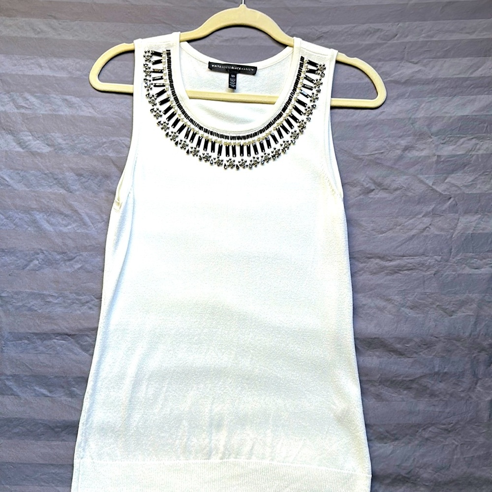 White House Black Market sleeveless sweater in XS.